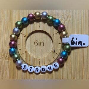Matte Metallic Multicolor Beaded Bracelet with 'STRONG' Charm